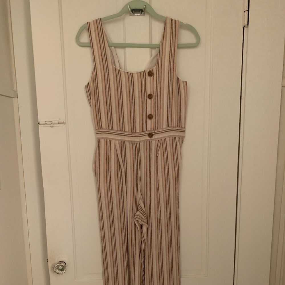 Woman’s striped neutral jumper with pockets!